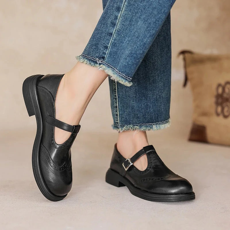 Woman wearing the Verda T-strap shoes in black
