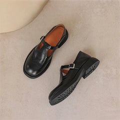 Verda T-strap shoes in black, top view