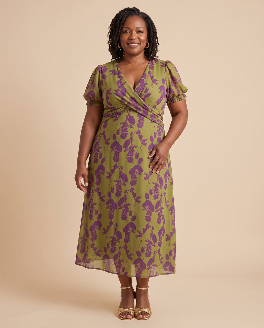 Stella & Grace™ | Relaxed Floral Midi Dress worn by a woman with curves